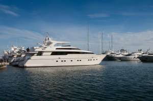 A line of yachts docked at the pier - Monaco Yacht Rentals